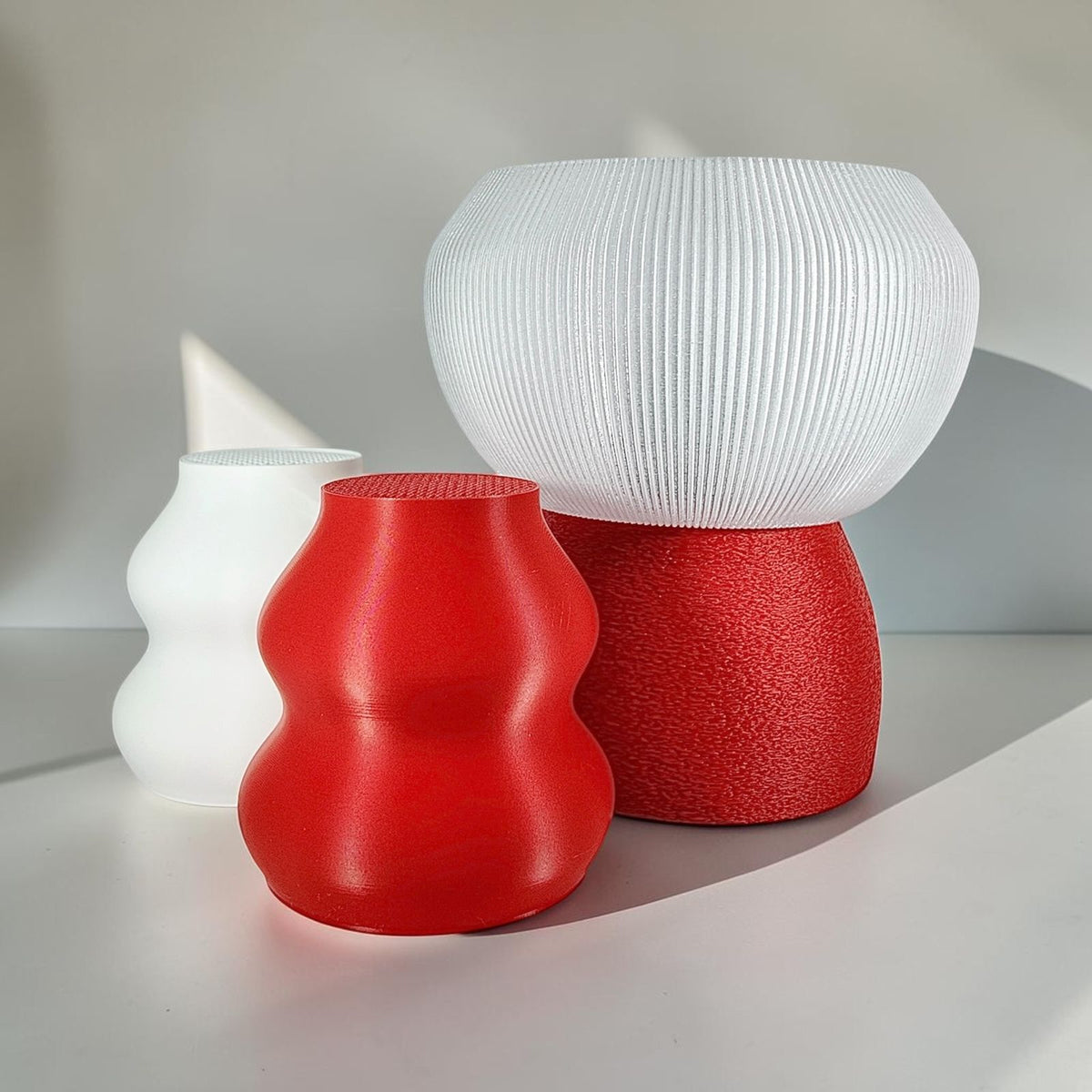 MELO lamp shown with two interchangeable diffusers